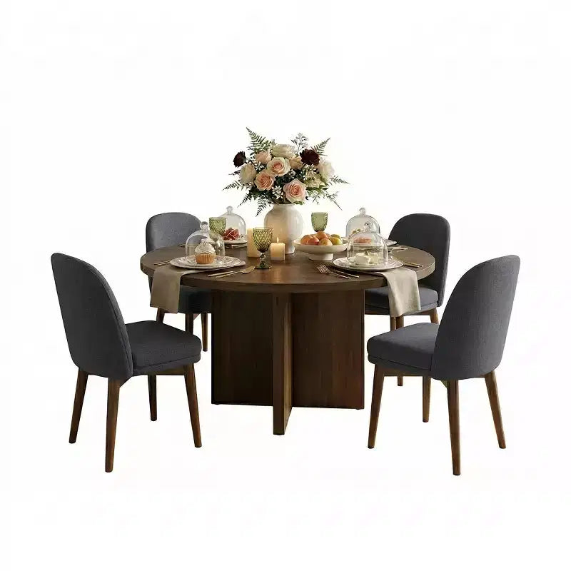 Table à manger ronde de style Mid-Century avec plateau en placage de noyer, piétement croisé en bois massif et chaises en lin avec pieds en bois massif.