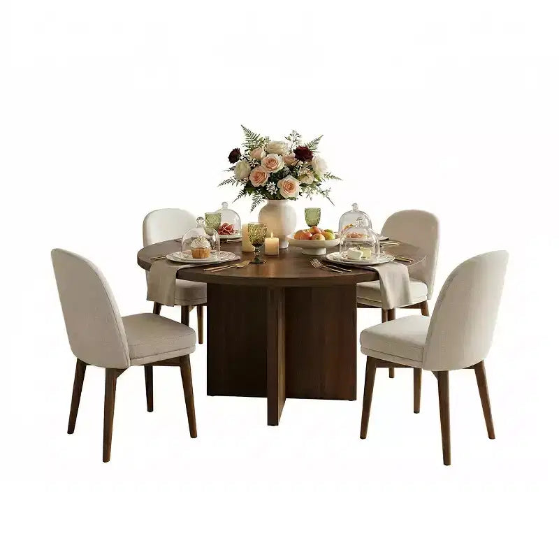 Table à manger ronde de style Mid-Century avec plateau en placage de noyer, piétement croisé en bois massif et chaises en lin avec pieds en bois massif.