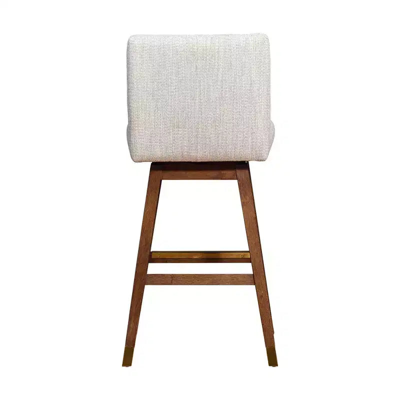 Tabouret de bar pivotant Basila en bois avec finition en tissu