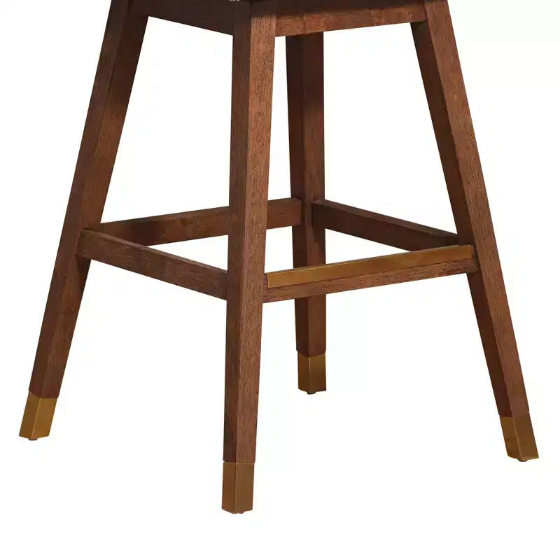 Tabouret de bar pivotant Basila en bois avec finition en tissu